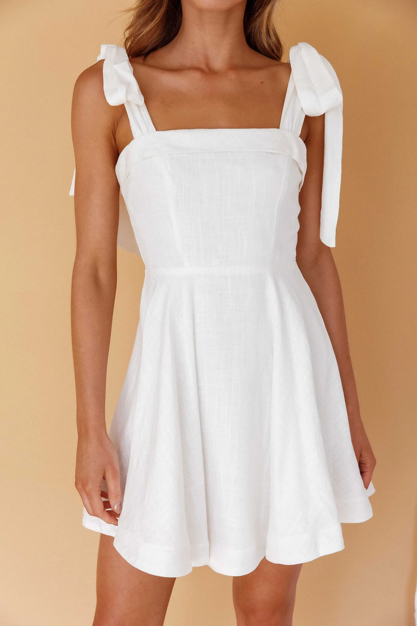 Jeanie Bow Shoulder Mini Dress Off White